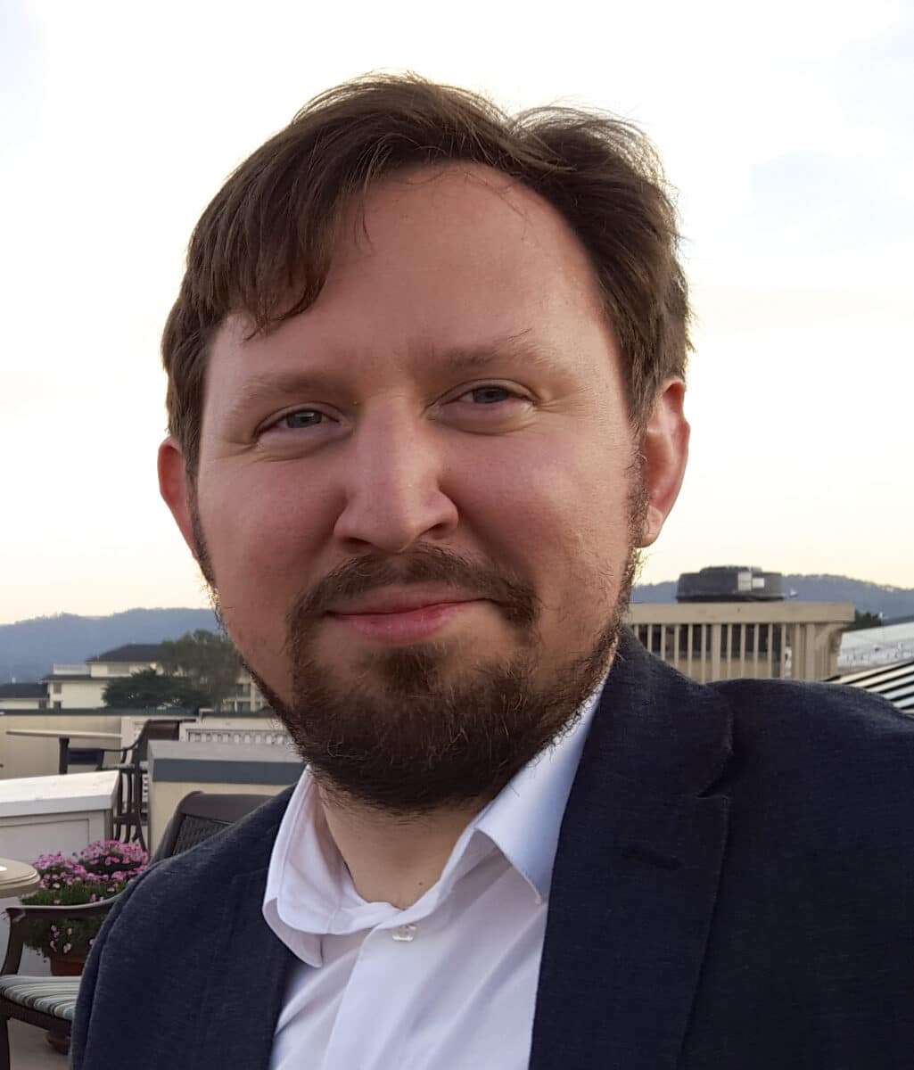 Headshot photo of Piotr Kosicki